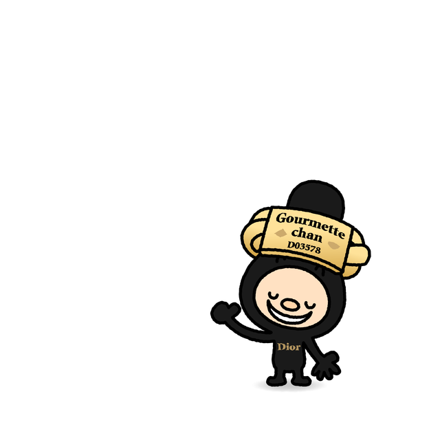 金色のゴルメットをつけてほほえむ黒いゴルメットちゃん